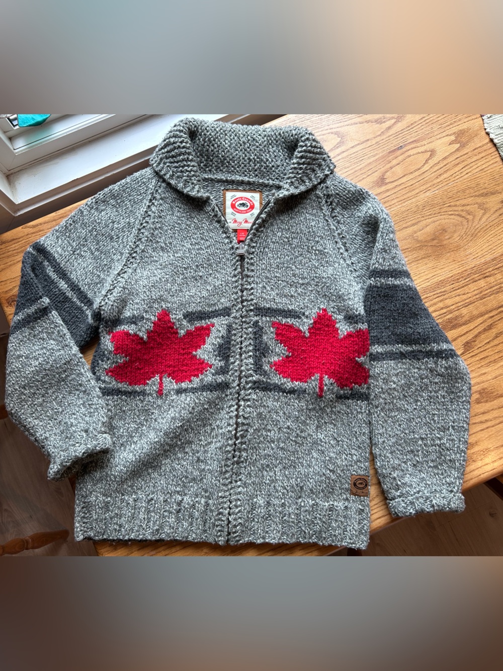 Roots Grey Zip Cardigan with Red Maple Intarsia and Hockey Figure on the Back